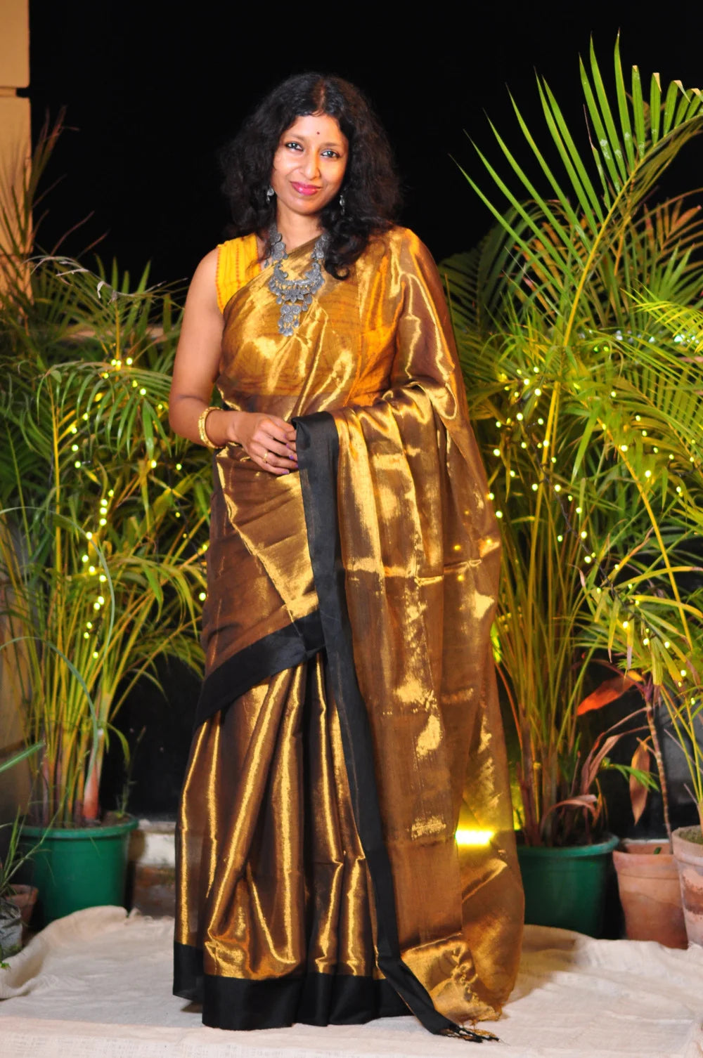Royal Elegance – Golden Body Black Border Tissue Saree with Matching Blouse Piece ✨