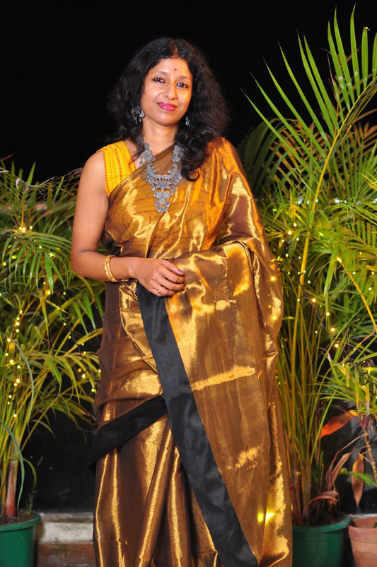 Royal Elegance – Golden Body Black Border Tissue Saree with Matching Blouse Piece ✨