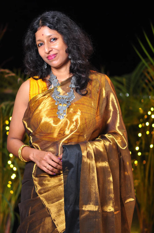 Royal Elegance – Golden Body Black Border Tissue Saree with Matching Blouse Piece ✨